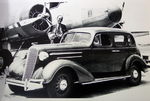 Chevrolet Parts -  1936 4-DOOR 3/4 FRONT VIEW W/PLANE B&W PHOTO
