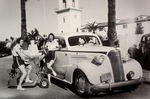 Chevrolet Parts -  1937 2DR SEDAN W/LADIES-3/4 FRONT B&W PHOTO