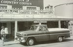1964-66 GMC 1/2T LONG FLEET AT STORE B&W PHOTO